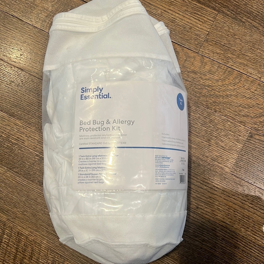 XL twin mattress pad New never used “simply essential”